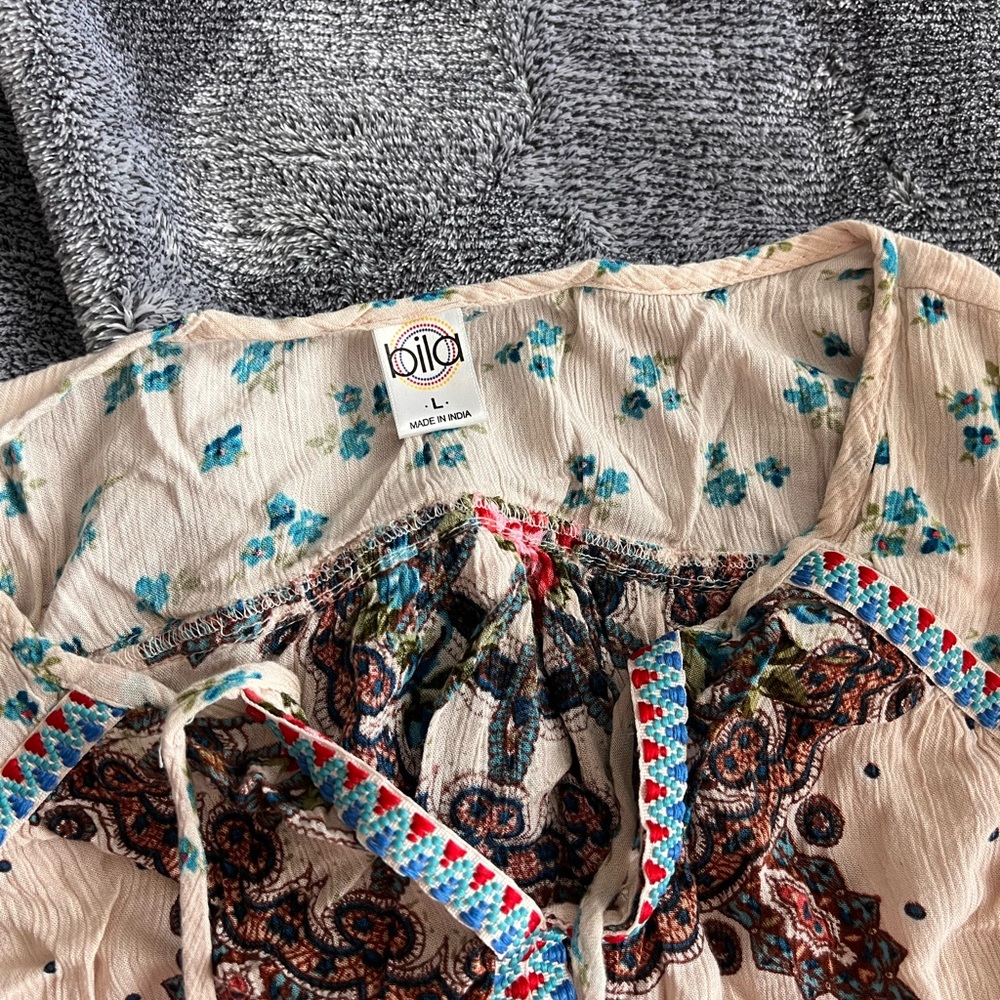 NWOT Bila tank top. Flowy and soft material.